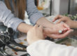 patient asks what is holistic therapy while an expert explores wrist pressure points