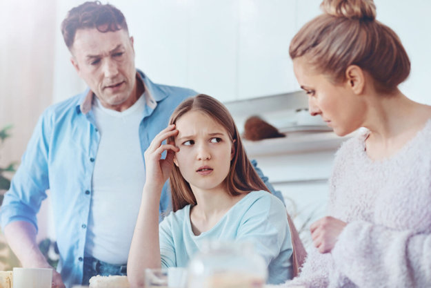 parents and daughter showing why do teens fight with parents