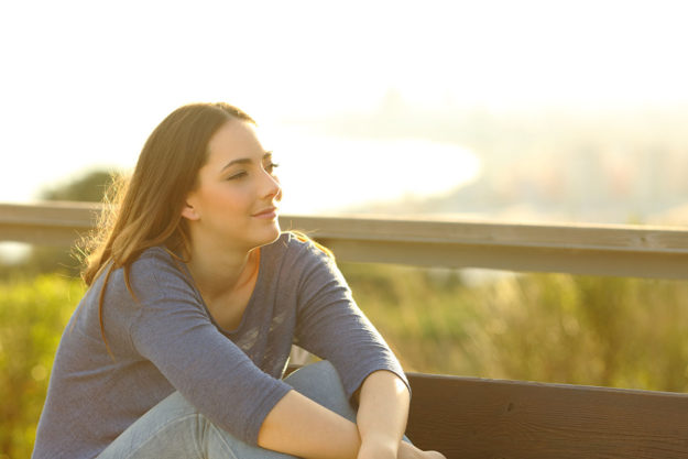 teen outside feeling positive self esteem