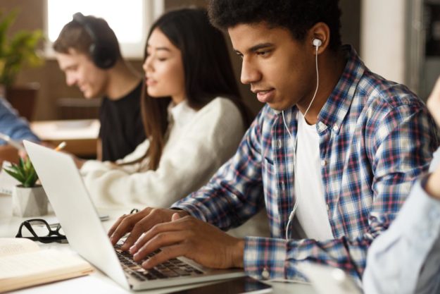 people-working-on-laptops-as-life-skills-for-teens